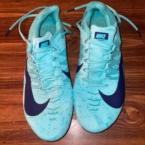 NIKE- Blue sprinting track and field spikes
